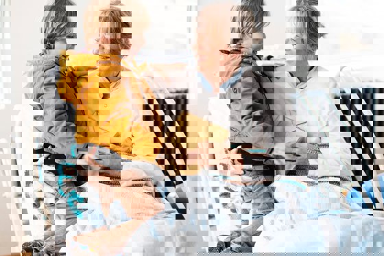 Grandmother enjoying the visit of her grandkid in the hospital