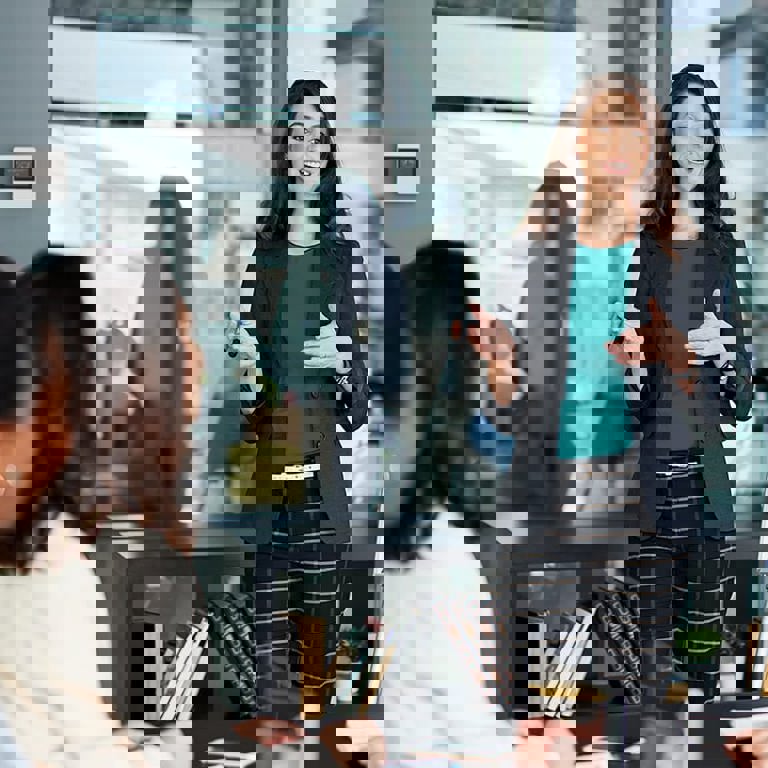 Woman explaining how to renovate the office with new radiators