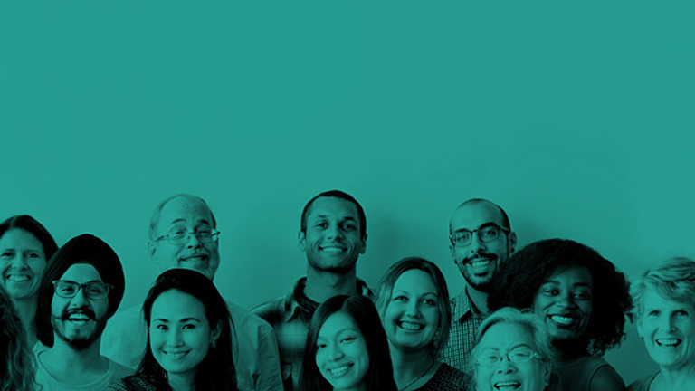 A group of people smiling