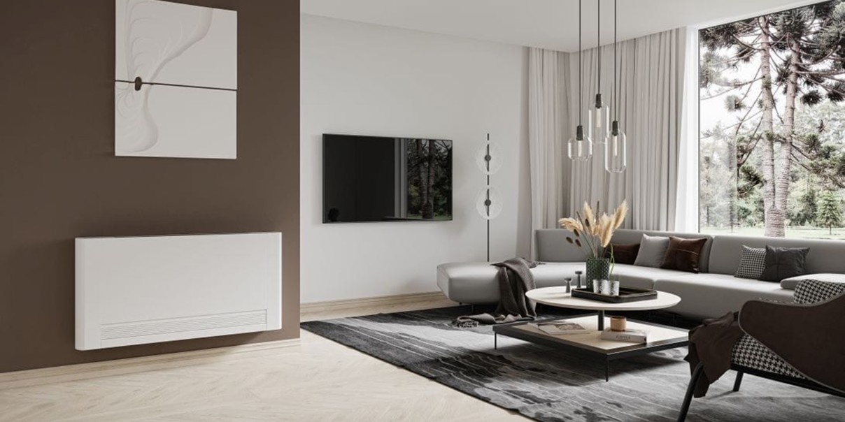 Modern living room with a sleek white fan convector radiator mounted on a brown accent wall.