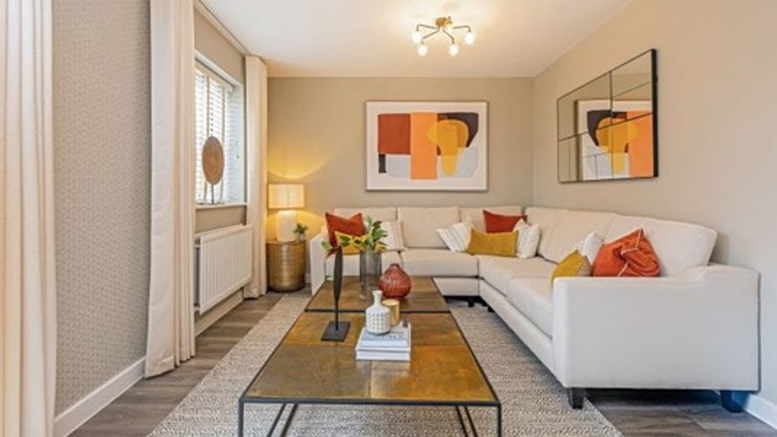 Modern living room interior featuring a white panel radiator beneath the window.