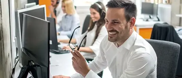 Guy staring at his computer screen